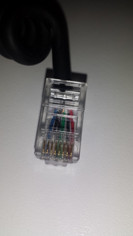 Image of the repaired cable with the rj-45 connector crimped on.
