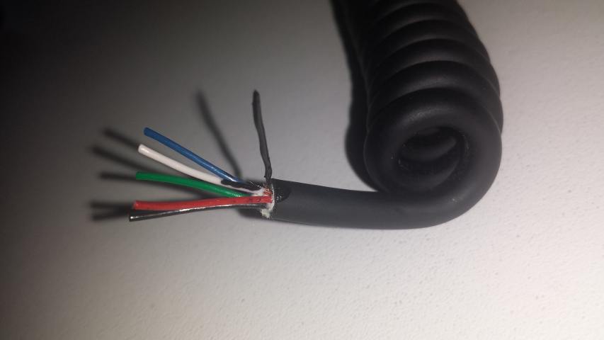 Cable with liquid electrical tape over formerly bare stranded wires.